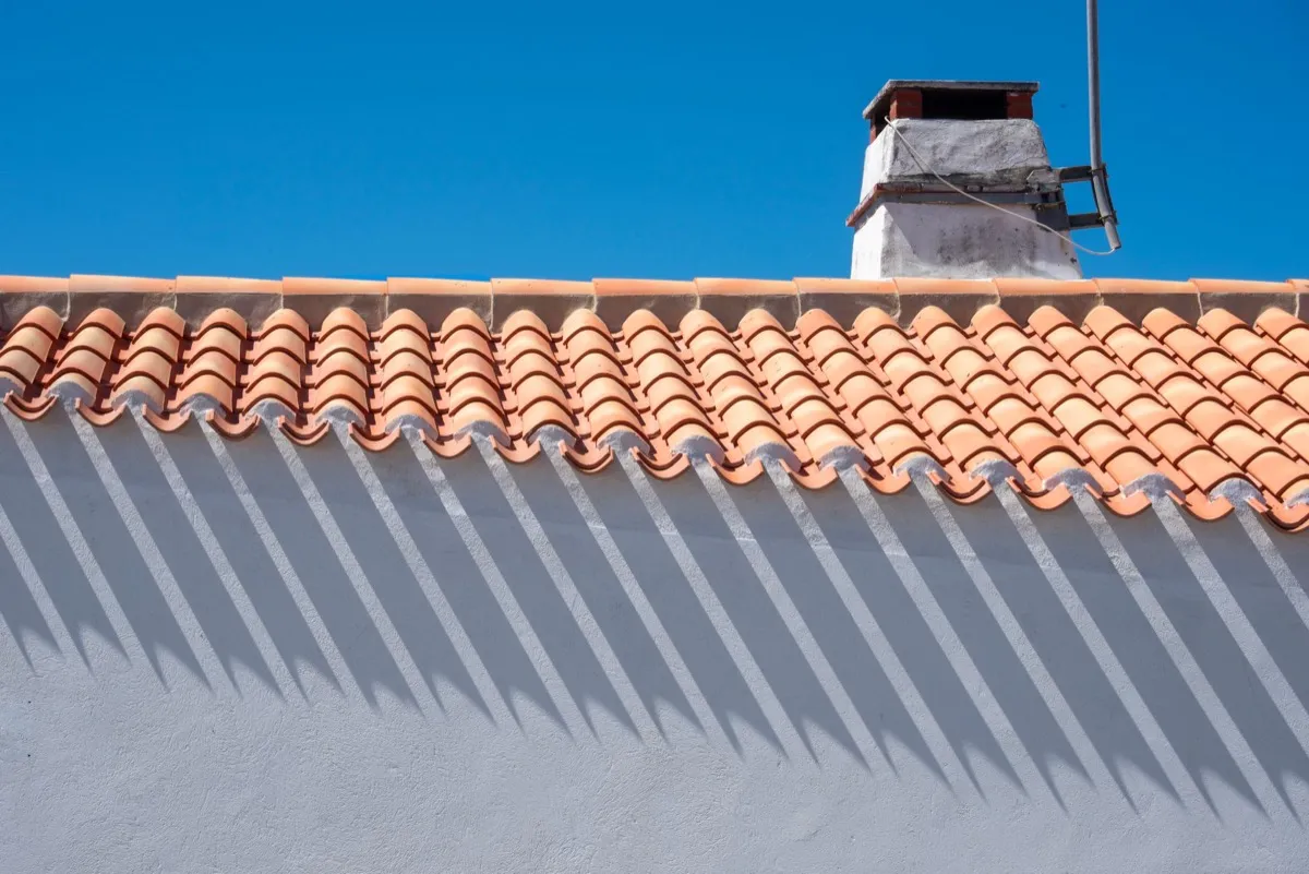 Roof ridge line and chimney on a home in Laredo, TX
